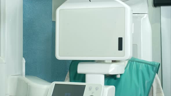 Senior Patient Doing Examination of Teeth By Using Panoramic and Cephalometric X-Ray Scanner alt