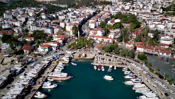 The top view from the drone of Kas resorts, bay, yahts, city in Mugla in Turkey alt
