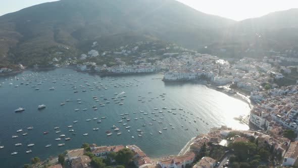 Drone Flight Over Bay of Town Cadaques at Sunset alt