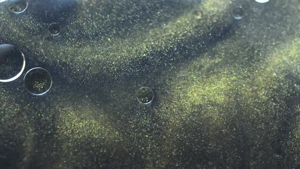 Macro Rotation Of Gold Particles In Water