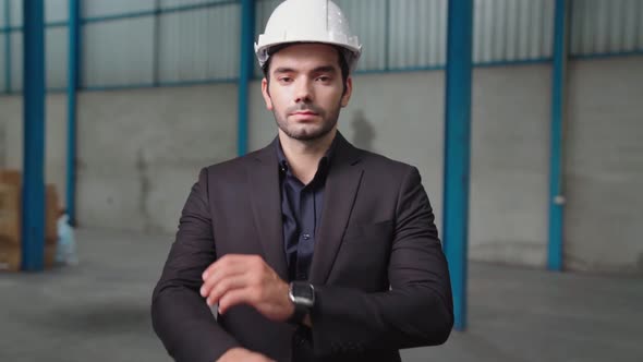 Portrait Confident Factory Manager Wearing Suit and Safety Helmet alt