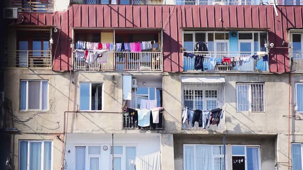 Caucasus Block House In Summer With Hanging Clothes.Caucasus Culture alt