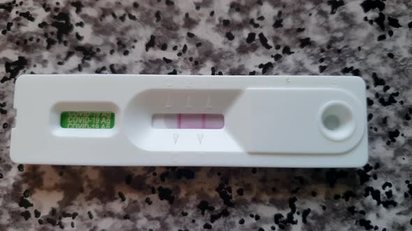 Covid 19 Rapid Antigen Test Kit Atk Video Showing Result Of positive Infected With Two Red Lines