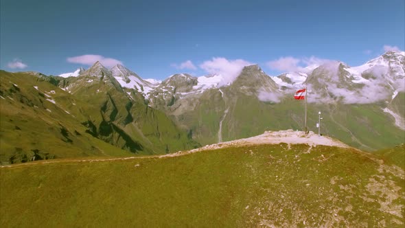 Flag of Austria on the top of Grossglockner road alt