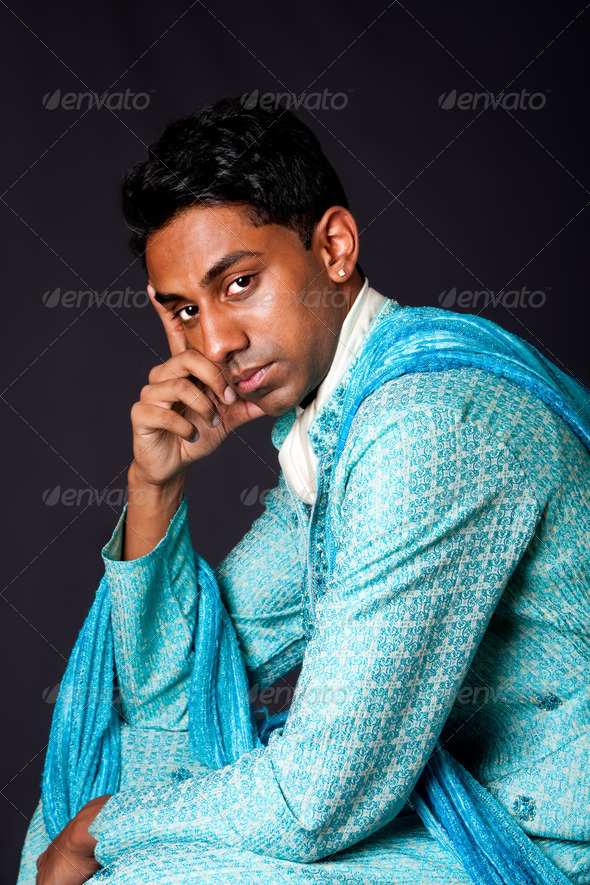 Hindu man sitting and thinking - Stock Photo - Images