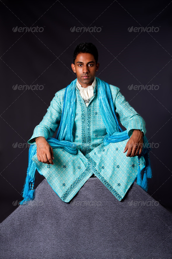 Hindu man sitting in lotus position - Stock Photo - Images