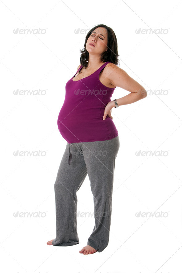 Pregnant woman with back pain - Stock Photo - Images