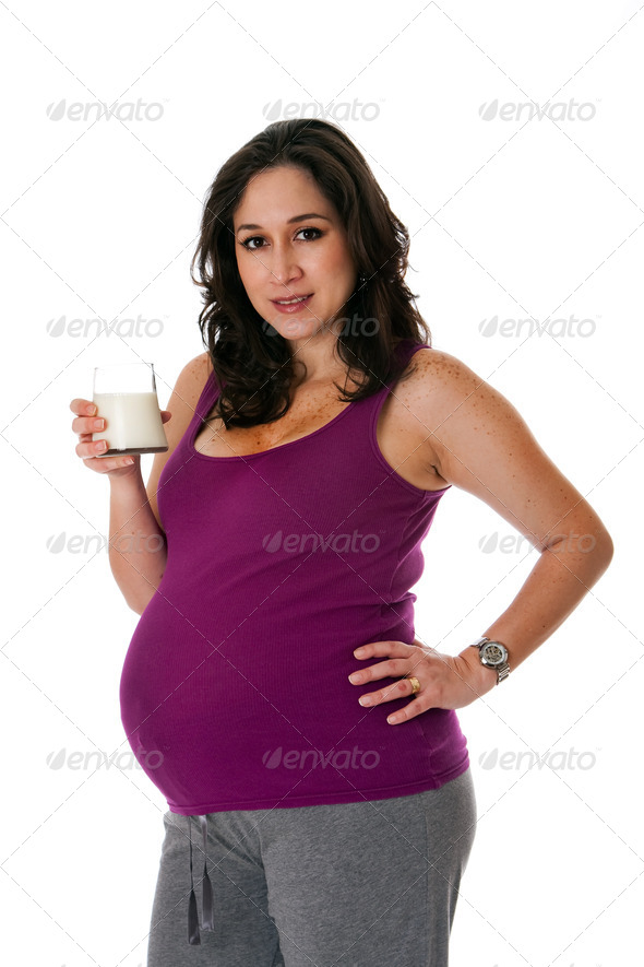 Healthy pregnant woman with milk - Stock Photo - Images