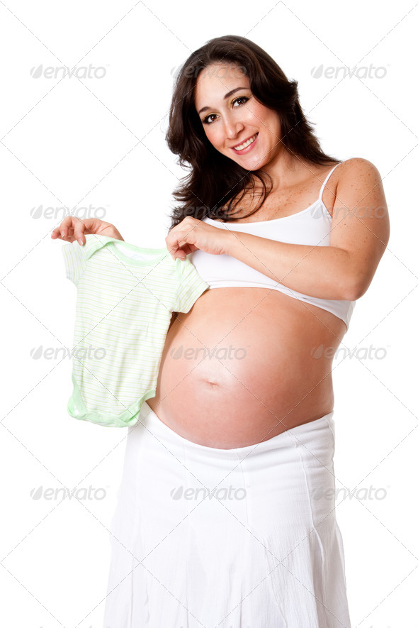 Pregnant woman holding baby bodysuit - Stock Photo - Images