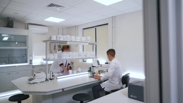 Scientists Work in the Laboratory alt