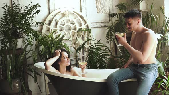 Young couple spending time together in their beautiful house alt