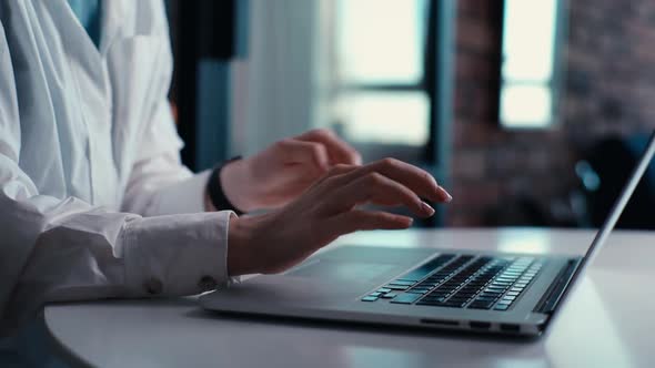 Closeup Hands of Unrecognizable Young Business Woman Having Wrist Pain During Working at Laptop alt
