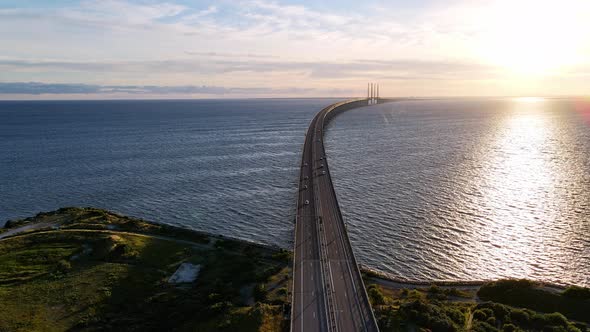 Drone Flying Over Oresund Bridge at the Sunset in Summer