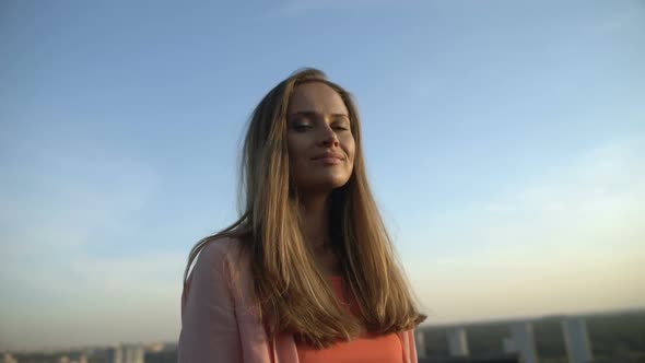 Beautiful Blonde Woman Posing Against Cityscape Background, Photo Session