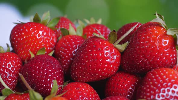 Fresh Strawberries at Green Background