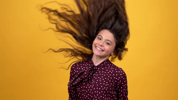 Happy Child Waving Her Long Beautiful Healthy Curly Hair Presenting Shampoo Beauty alt