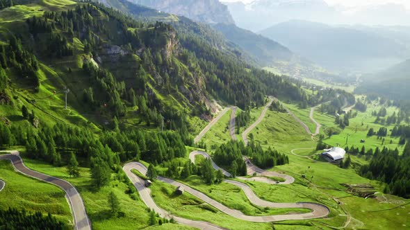 Stunning winding road at Passo Gardena, areal view, Dolomites alt