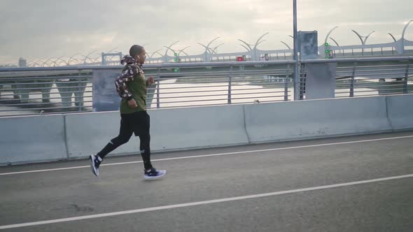 Back View of Happy Black African American Confident Man in Slow Motion Doing Sport and Follow alt