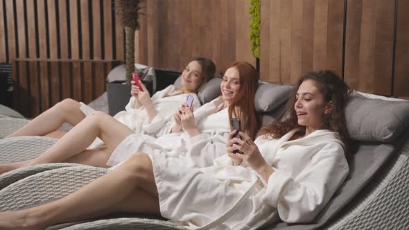 Women with Smartphone in Spa Center