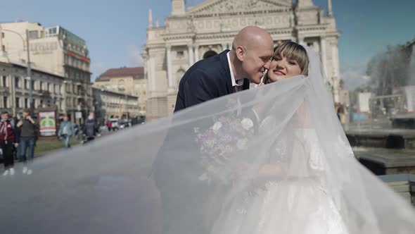 Newlyweds in the Center of the Old Town. Bride and Groom. Wedding alt