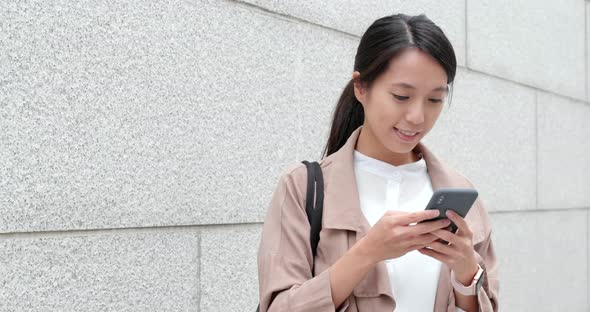 Business woman work on smart phone alt