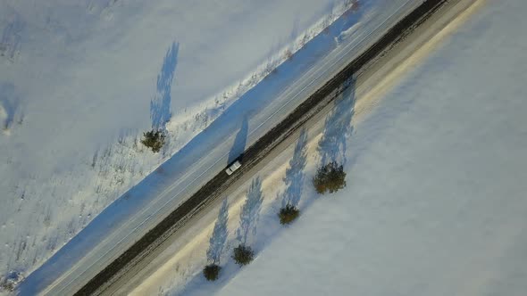 Car On The Winter Road From Above