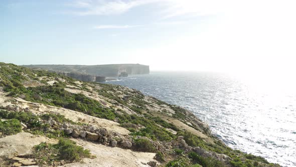 Walking Near Coastline of Mediterranean Sea in Flo Azure Window Region in Malta