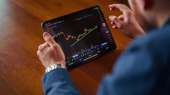 Businessman checking bitcoin price chart on digital exchange on mobile phone screen, cryptocurrency alt