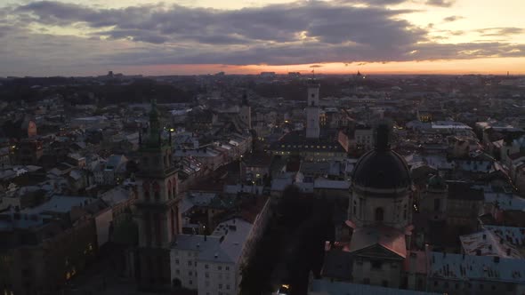 Flight Above the Roofs on Nighte. Old European City. Ukraine Lviv