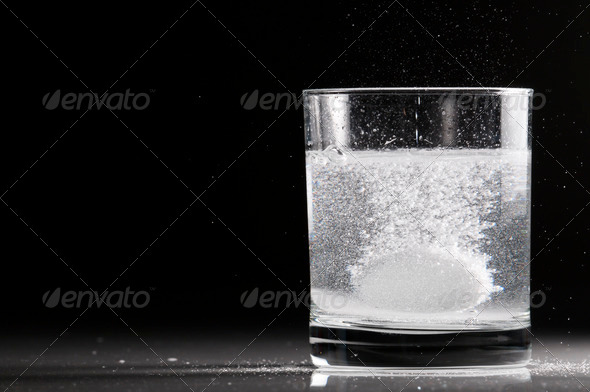 Effervescent Pill in a Glass of Water - Stock Photo - Images