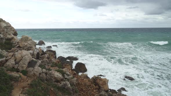 Azure Colour Mediterranean Sea Washing the Shore of Golden Beach Bay in Malta