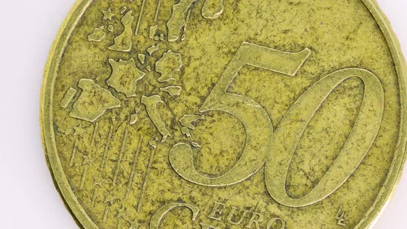 Fifty cent coin extreme close up, macro shot. 1 euro coin very close detail view over withe backgrou alt