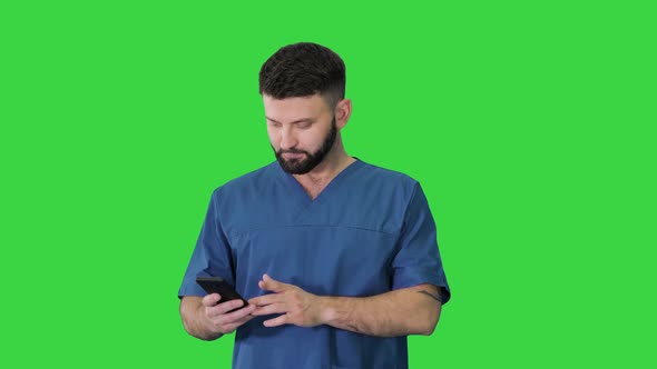 Surgeon Doctor Walking Using His Phone Green Screen Chroma Key alt