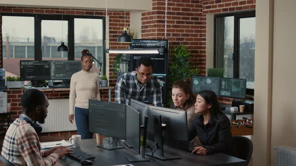 Software Engineers Brainstorming Ideas Looking at Code on Computer Screens Asking Feedback alt