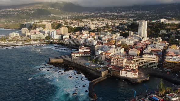 Drone over Puerto de la Cruz, city in Tenerife, Canary Islands, Spain alt