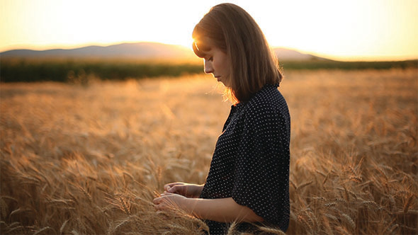 Girl On The Wheat Field