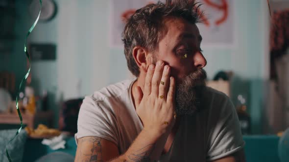 Drunk Man Suffering From Hangover alt