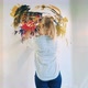 Blond Woman is Painting with Her Hands As Arttherapy