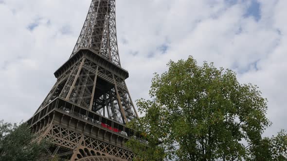 World wide famous Eiffel tower in Paris France slow tilt 4K 2160p 30fps UltraHD footage - Constructi