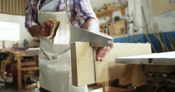 Carpenter working on his craft alt