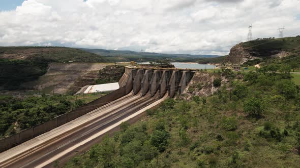 Cinematic drone footage - flying sideways over the river showing a hydroeletric at minas gerais in B alt