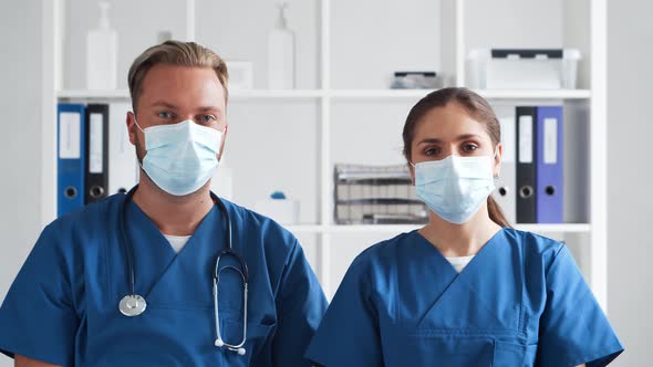 Professional medical doctors working in hospital office. Physician and the young nurse. alt