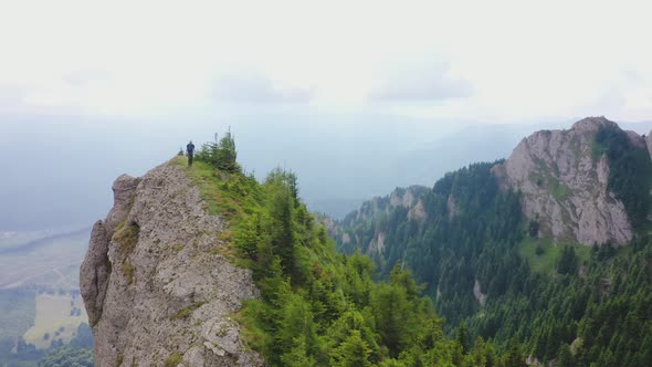 Man on top of the Rock