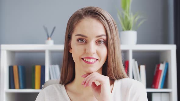 Young Woman Works at Home Office Using Computer. alt