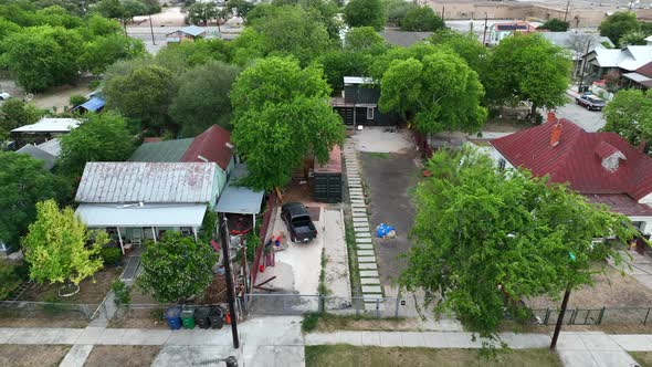 Rural homes in Southwest USA. Residential houses. Aerial truck shot. Hispanic community. alt