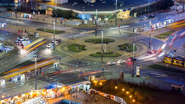 Timelapse of Aerial View of Busy Traffic at Dmowski Roundabout During Dusk, Warsaw, Poland