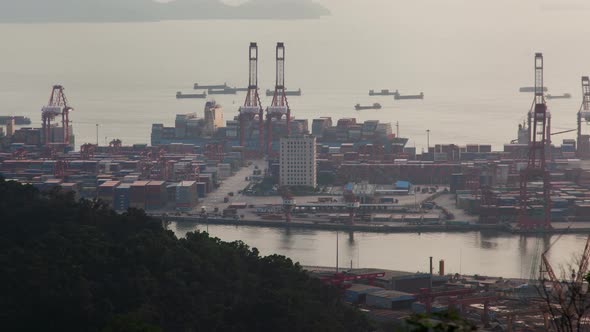 Shenzhen China Container Port Terminal and Logistics Center Timelapse Pan Up alt