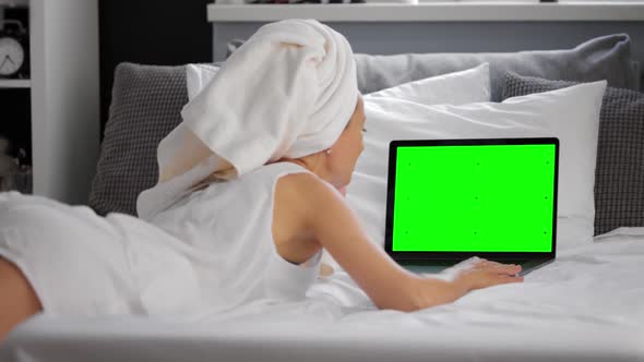 Woman with Laptop Green Screen