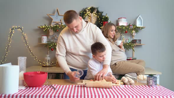 Happy Family Together Prepares Traditional Dishes From the Dough for New Year alt