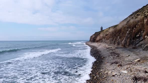 Lighthouse on the sea coast